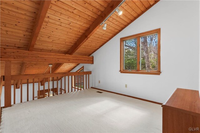 367 Saunders Dr, Lehman Twp, PA 18324 - additional living space with wooden ceiling, carpet, vaulted ceiling with beams, and baseboards