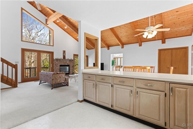 367 Saunders Dr, Lehman Twp, PA 18324 - kitchen featuring light countertops, a fireplace, ceiling fan, and wood ceiling