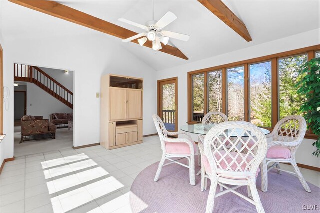 367 Saunders Dr, Lehman Twp, PA 18324 - dining area with high vaulted ceiling, beam ceiling, a ceiling fan, light tile patterned floors, and baseboards