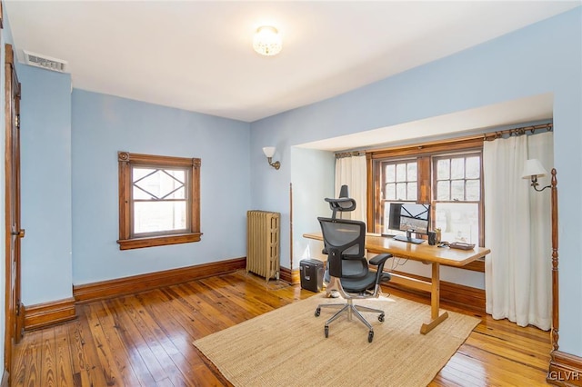 1527 W Turner St, Allentown City, PA 18102 - office area featuring baseboards, hardwood / wood-style flooring, and radiator