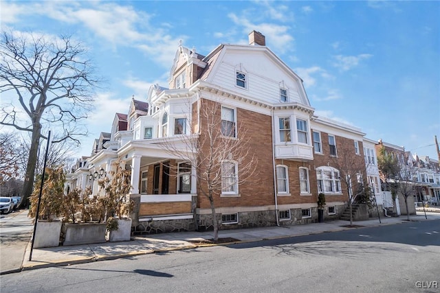 1527 W Turner St, Allentown City, PA 18102 - view of side of home with a chimney and a residential view