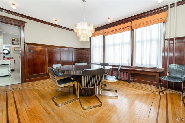 1527 W Turner St, Allentown City, PA 18102 - dining area featuring a chandelier, crown molding, hardwood / wood-style flooring, and a wainscoted wall