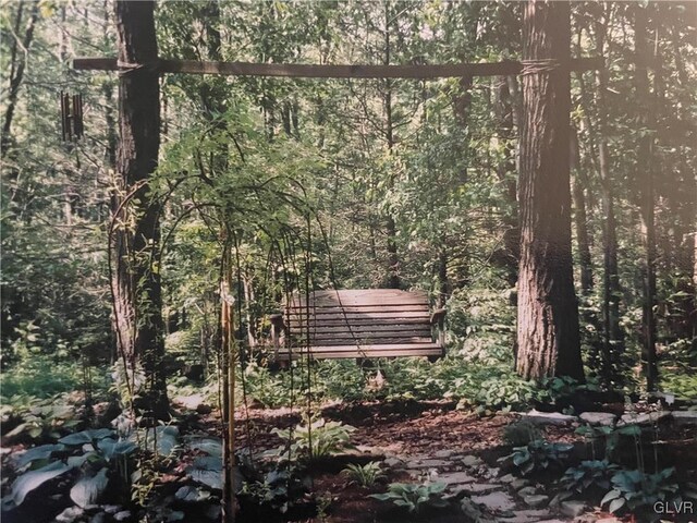 exterior space with a view of trees