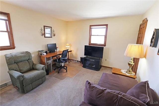 office featuring visible vents, baseboards, and carpet
