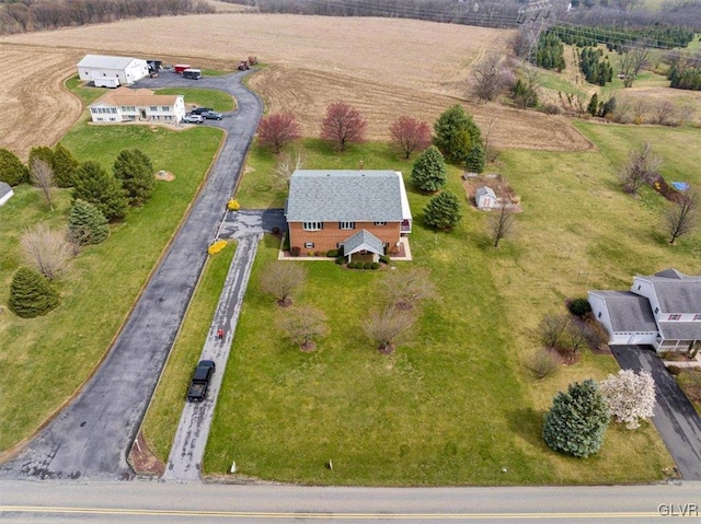 birds eye view of property featuring a rural view