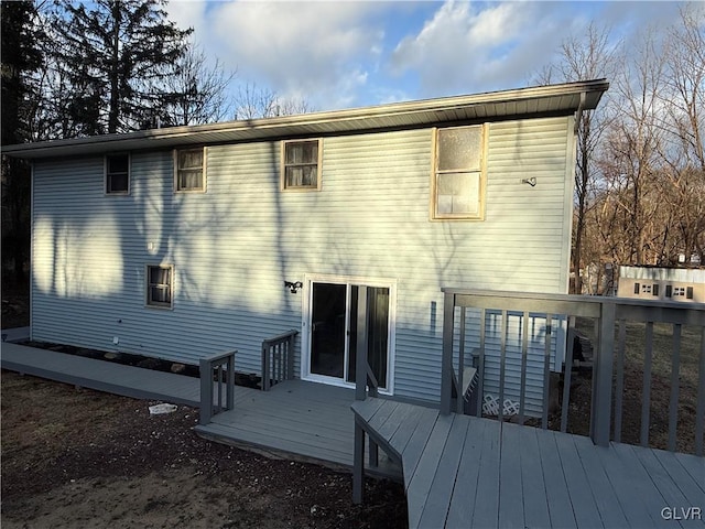 rear view of property with a deck