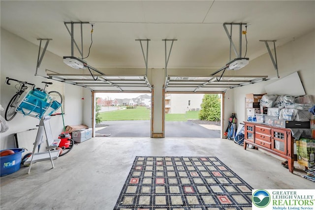 garage featuring a garage door opener