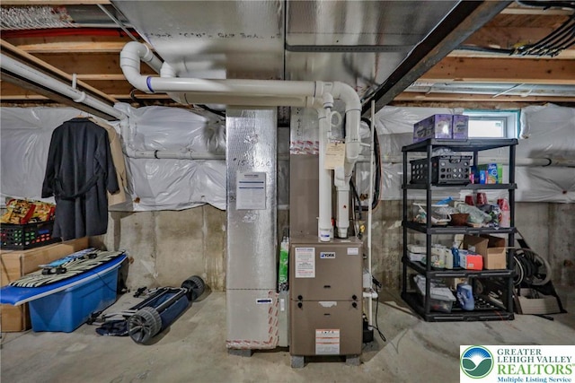 utility room with heating unit