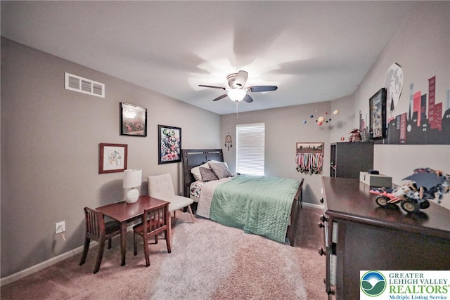 bedroom featuring visible vents, baseboards, a ceiling fan, and carpet