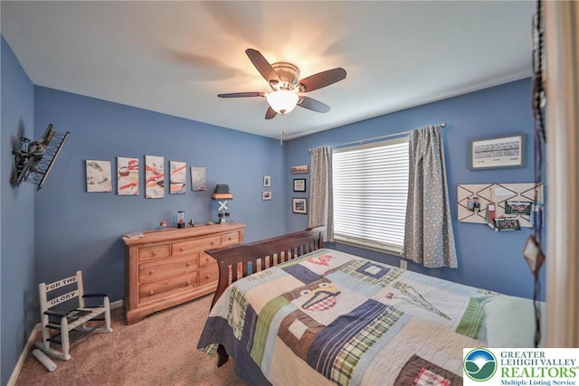 bedroom with baseboards, a ceiling fan, and carpet