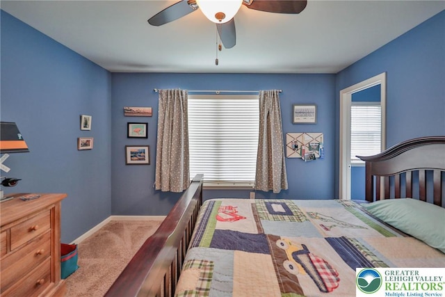 bedroom with baseboards, a ceiling fan, and carpet floors