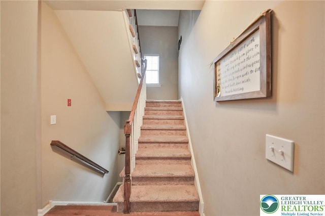 staircase with baseboards