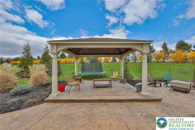 view of patio / terrace featuring a trampoline and a gazebo