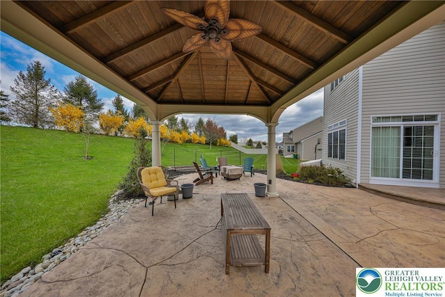 view of patio featuring an outdoor fire pit