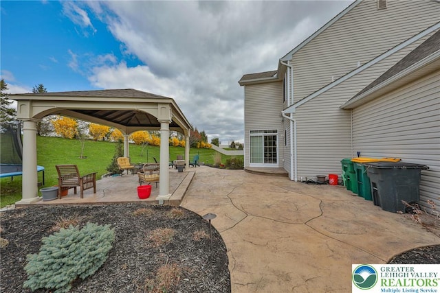 view of patio / terrace with a gazebo and a trampoline