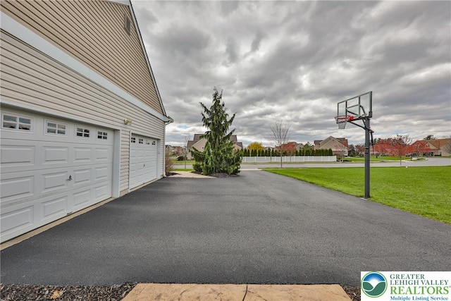 exterior space with aphalt driveway