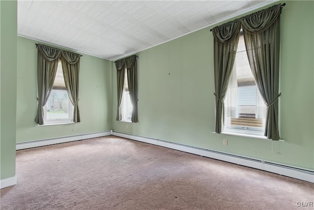 221 Franklin St, Alburtis Borough, PA 18011 - empty room with ornamental molding, baseboards, carpet flooring, and a baseboard heating unit