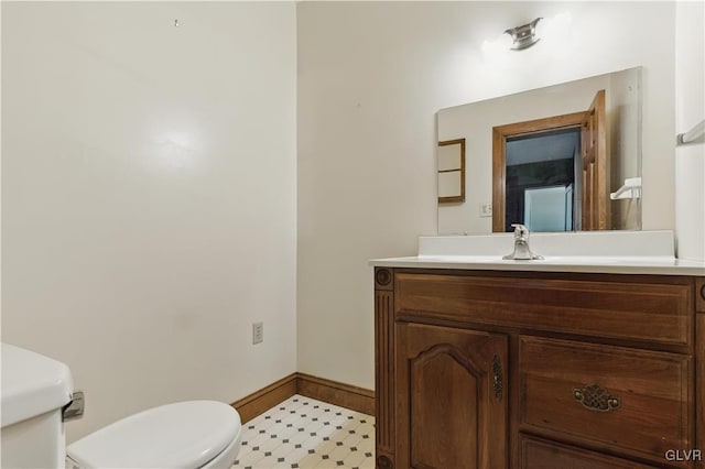 221 Franklin St, Alburtis Borough, PA 18011 - bathroom featuring tile patterned floors, vanity, baseboards, and toilet