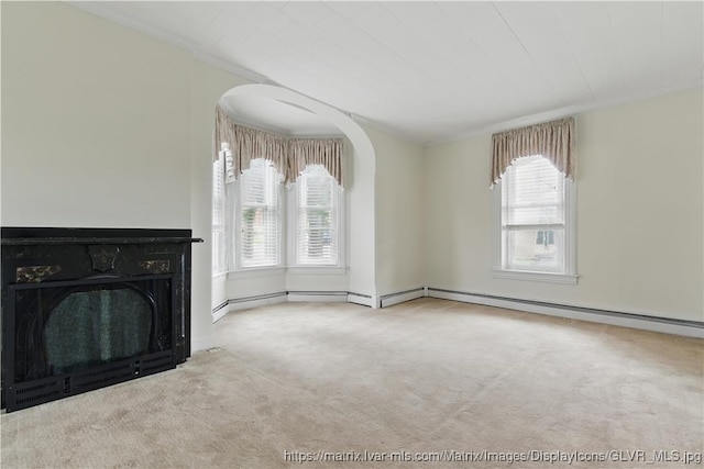 221 Franklin St, Alburtis Borough, PA 18011 - unfurnished living room with ornamental molding, carpet floors, and a fireplace