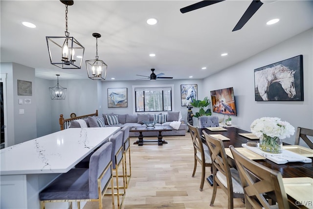 5627 Pembrook Dr, Coolbaugh Twp, PA 18466 - dining space with ceiling fan, recessed lighting, light wood-type flooring, and a chandelier
