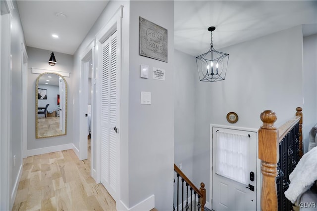 5627 Pembrook Dr, Coolbaugh Twp, PA 18466 - corridor with an upstairs landing, arched walkways, a chandelier, and recessed lighting