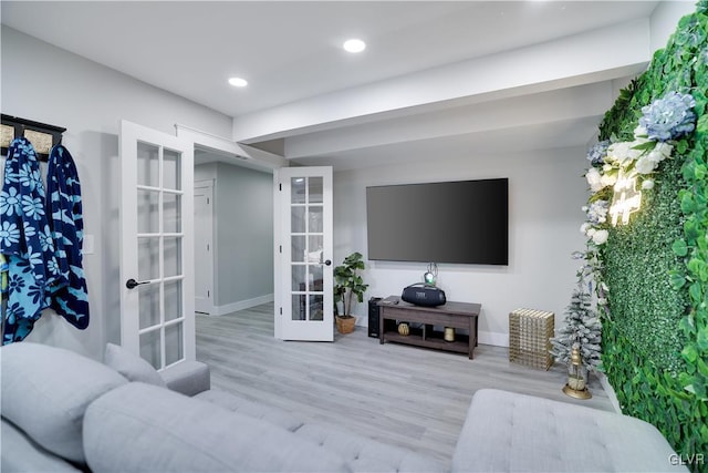 5627 Pembrook Dr, Coolbaugh Twp, PA 18466 - living room with french doors, wood finished floors, and recessed lighting