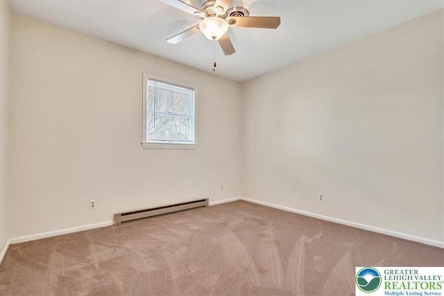 carpeted empty room featuring baseboard heating, baseboards, and a ceiling fan