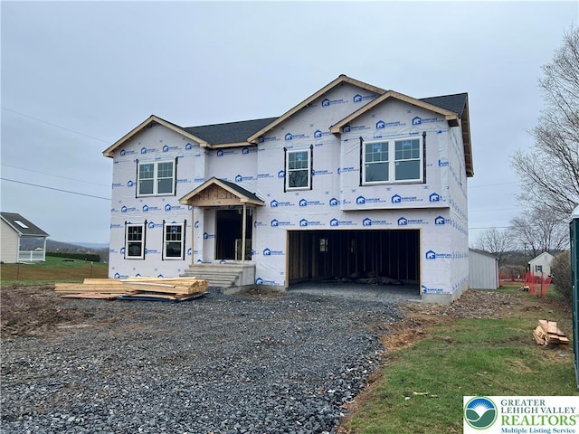 5743 Crescent Dr, North Whitehall Twp, PA 18078 - property in mid-construction featuring a garage and gravel driveway