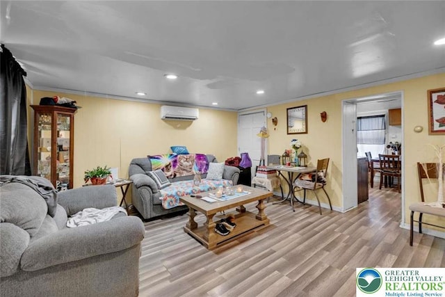 231 W Abbott St, Lansford Borough, PA 18232 - living area with a wall unit AC, ornamental molding, recessed lighting, wood finished floors, and baseboards