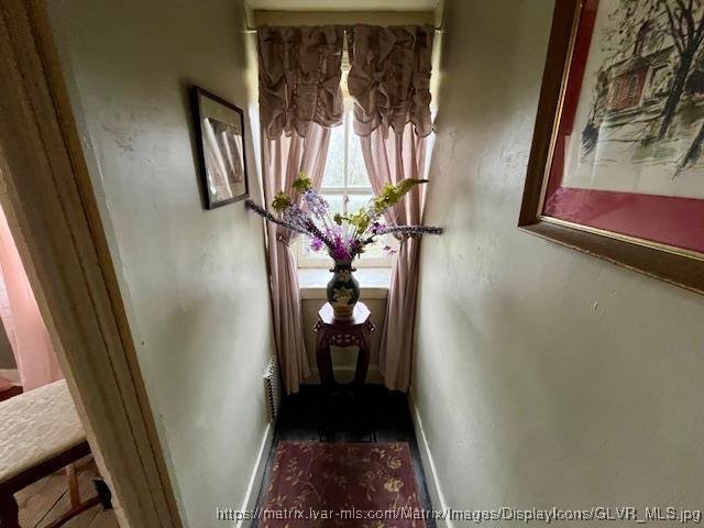 hallway with baseboards