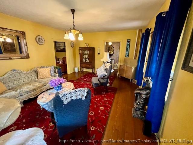 living room with wood finished floors