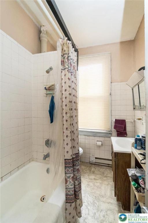 full bath with vanity, baseboard heating, toilet, shower / bathtub combination with curtain, and tile walls
