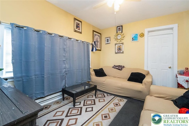 living area featuring ceiling fan