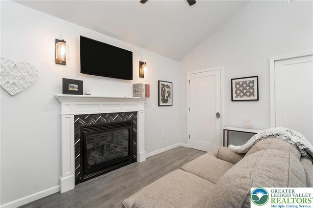 5112 Creek Rd, Heidelberg Twp, PA 18078 - living room with high vaulted ceiling, a fireplace, baseboards, and wood finished floors