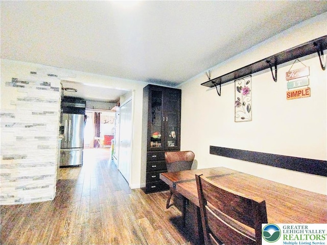 hall featuring wood finished floors