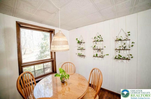 71 Dogwood Dr, Penn Forest Township, PA 18229 - dining room with an ornate ceiling, baseboards, and wood finished floors