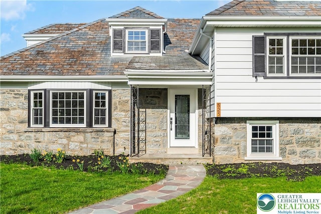 525 N Main St, Allentown City, PA 18104 - entrance to property featuring a high end roof, stone siding, and a lawn