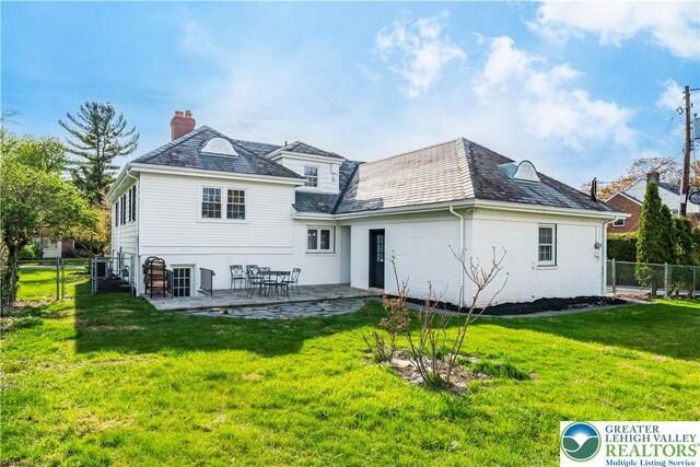 525 N Main St, Allentown City, PA 18104 - back of house featuring a high end roof, a chimney, and a patio area