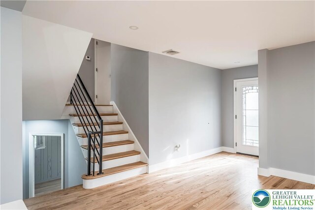 525 N Main St, Allentown City, PA 18104 - staircase featuring wood finished floors and baseboards