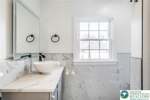 525 N Main St, Allentown City, PA 18104 - bathroom with plenty of natural light, vanity, and wainscoting
