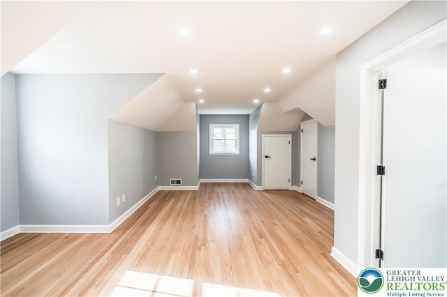 525 N Main St, Allentown City, PA 18104 - bonus room featuring light wood finished floors, vaulted ceiling, baseboards, and recessed lighting