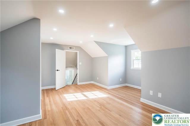 525 N Main St, Allentown City, PA 18104 - additional living space with lofted ceiling, baseboards, light wood-type flooring, and recessed lighting
