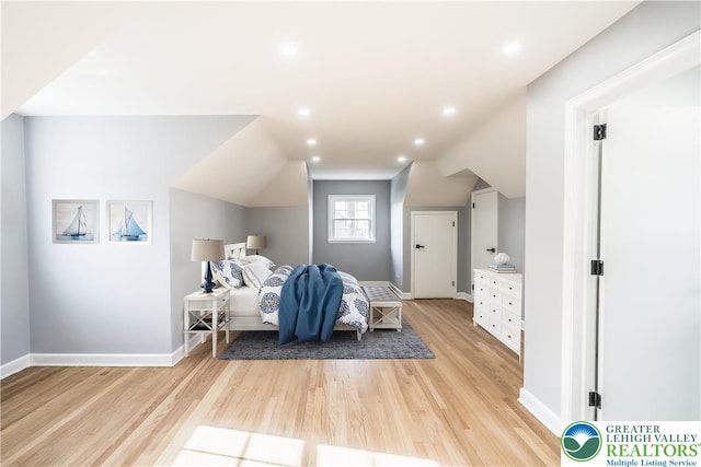 525 N Main St, Allentown City, PA 18104 - bedroom with light wood-style floors, baseboards, vaulted ceiling, and recessed lighting