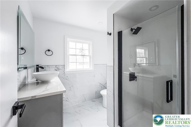 525 N Main St, Allentown City, PA 18104 - bathroom featuring a shower stall, marble finish floors, a wainscoted wall, vanity, and toilet