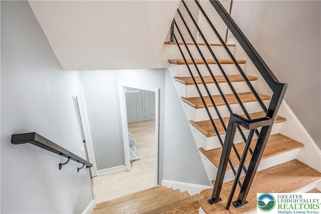 525 N Main St, Allentown City, PA 18104 - staircase featuring baseboards and wood finished floors