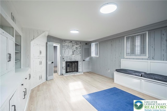 525 N Main St, Allentown City, PA 18104 - unfurnished living room featuring a fireplace and light wood-type flooring