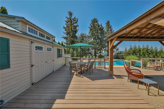 3332 Sherwood Rd, Palmer Twp, PA 18045 - deck featuring outdoor dining area, a gazebo, and a fenced in pool