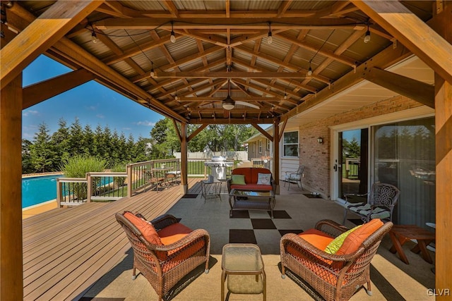 3332 Sherwood Rd, Palmer Twp, PA 18045 - wooden deck featuring outdoor lounge area, a ceiling fan, a patio area, and an outdoor pool