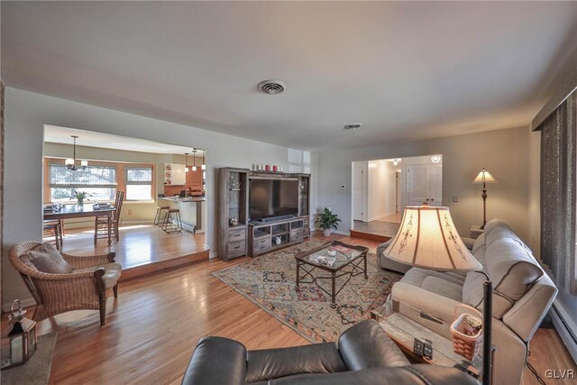 3332 Sherwood Rd, Palmer Twp, PA 18045 - living room featuring baseboards, wood finished floors, and visible vents