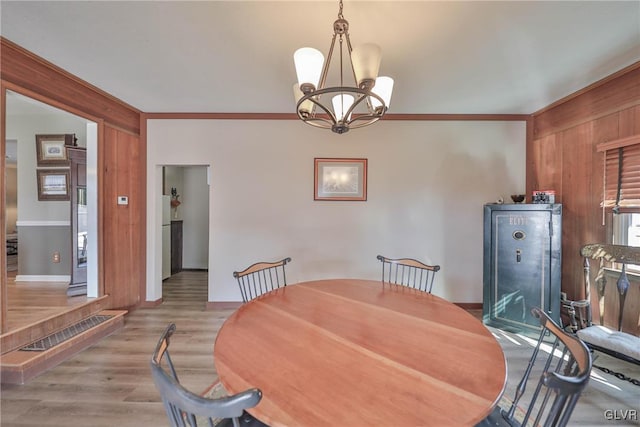 3332 Sherwood Rd, Palmer Twp, PA 18045 - dining area with ornamental molding, baseboards, a notable chandelier, and wood finished floors